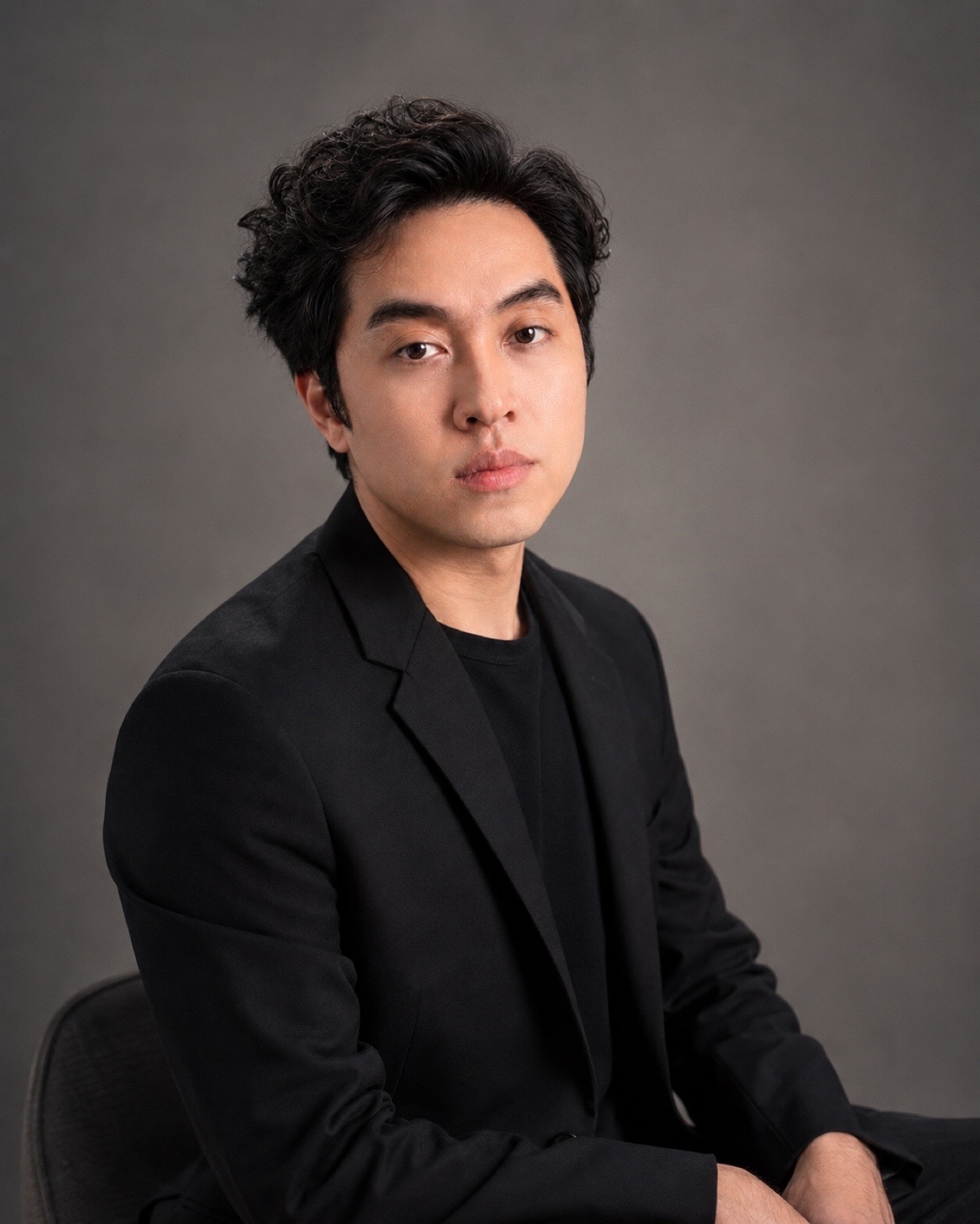 Professional headshot of Ryan V. Visith